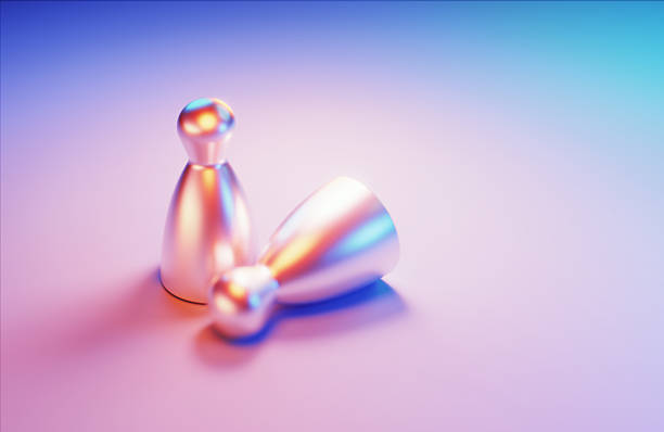 3D metallic pawns illuminated by blue and magenta lights on blue background.