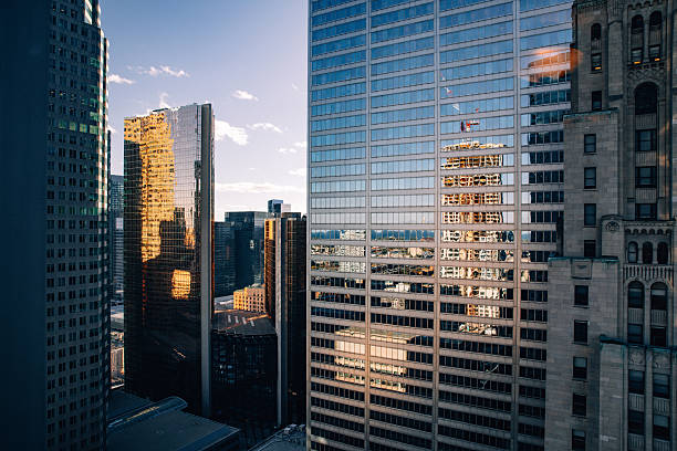 Tall apartment buildings,  architectural classic and modern full frame view, colorful reflections on glass facades. Toronto, Canada.