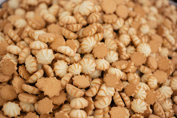 Delicious assorted cookies and biscuits filling the frame, creating a sweet pattern