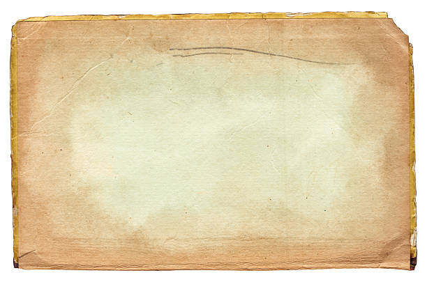 Vintage background of old ancient torn paper texture with spots isolated