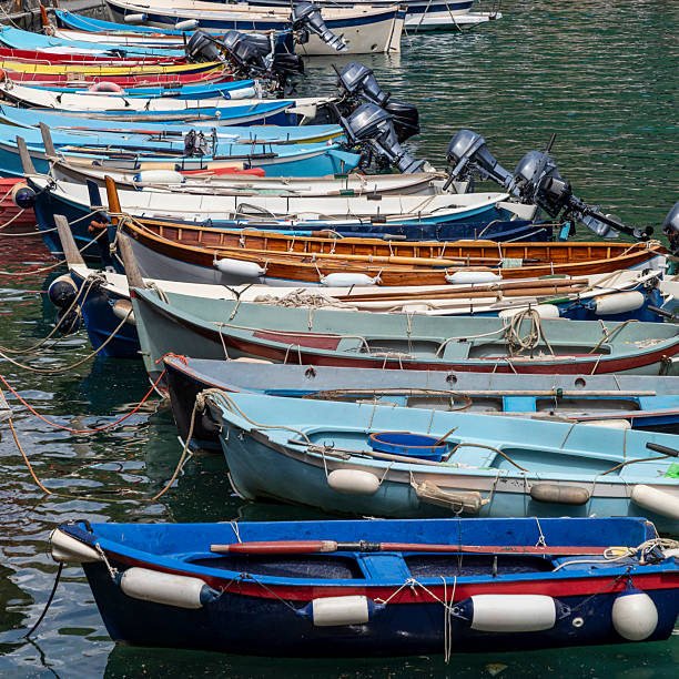 colourful boats moored in the harbour at vernazza cinque terre liguria italy sunny day