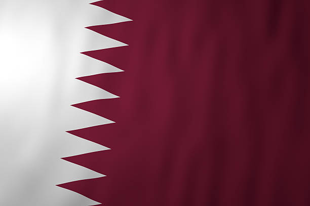 The national flag of Qatar featuring a white field with a distinctive maroon serrated band. The flag represents national identity, sovereignty, and the cultural heritage of the State of Qatar.