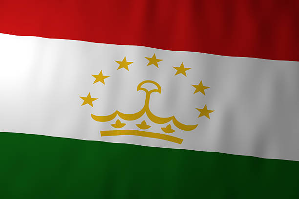 The national flag of Tajikistan displaying red, white, and green horizontal stripes with a gold crown and seven stars. The image represents Tajikistan, statehood, and national identity in Central Asia.