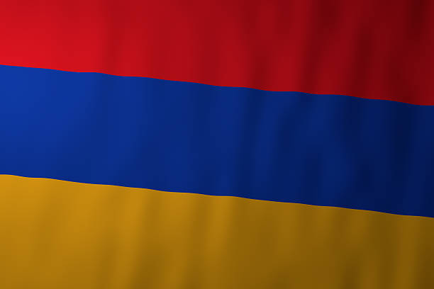 Small paper flag of Armenia pinned. Isolated on white background. Horizontal orientation. Close up photography. Copy space.