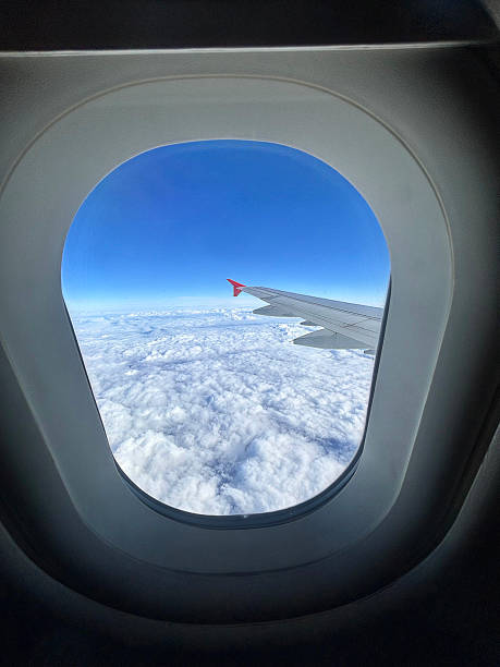 Flying above the clouds Aircraft wing