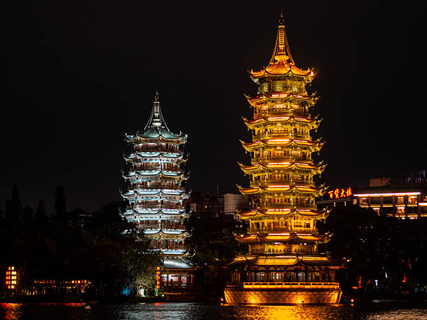 Guilin. Pagodas of Sun and Moon at night.