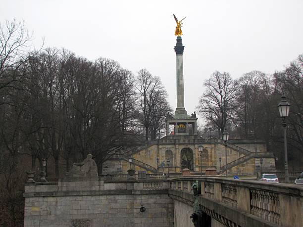 The Friedensengel monument in Munich rises above the Isar River, crowned by a gilded Nike statue, commemorating peace after the Franco-Prussian War of 1870–1871, DE, 17 Feb. 2011
