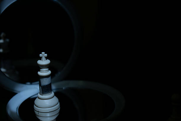 Moody conceptual image of a burning candle with smoke and clock symbolizing time passing, fragility, memory, urgency, reflection and the end of a cycle. Ideal for emotional, philosophical and mental health concepts.