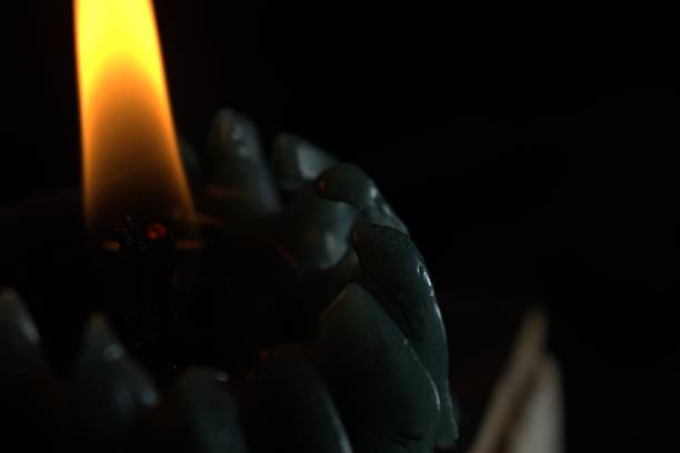 Candles burning in the dark of night