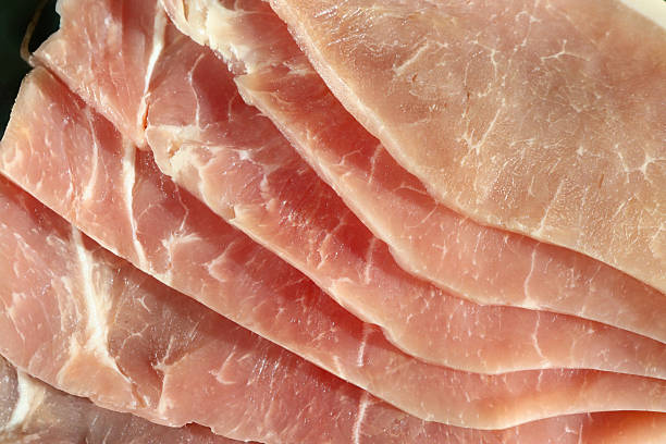 Meat grocery background, cutting jamon, close-up, macro photography