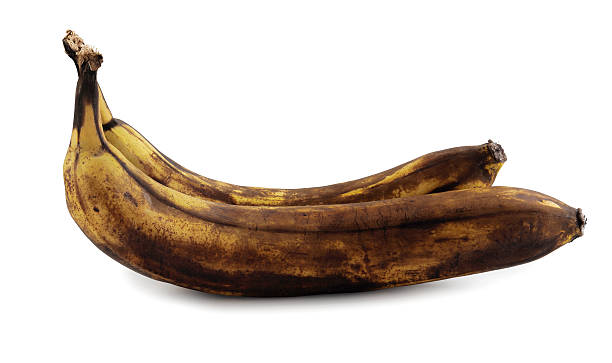 istock overripe banana, isolated on white banana 2259818509