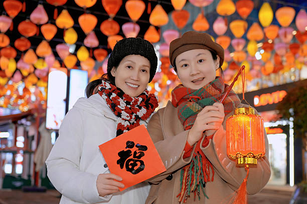 Two Women Celebrate Spring Festival with Lanterns