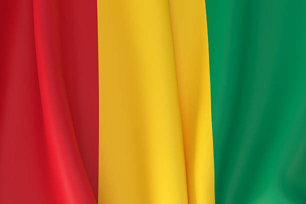 Flag of Guinea with vertical red yellow and green stripes waving