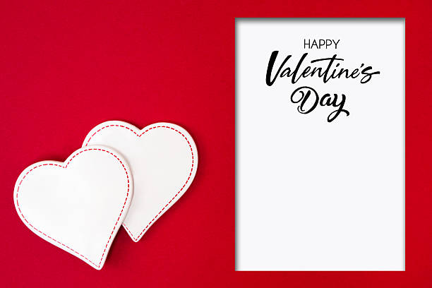 Valentines day greeting card with hearts, and white card on red background