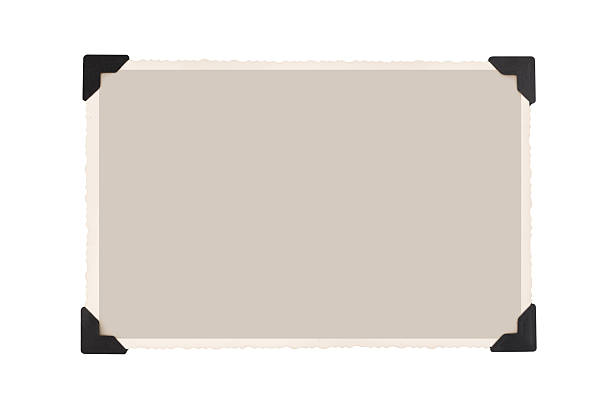 Old Blank Photo Paper Frame with Corners Isolated on White Background