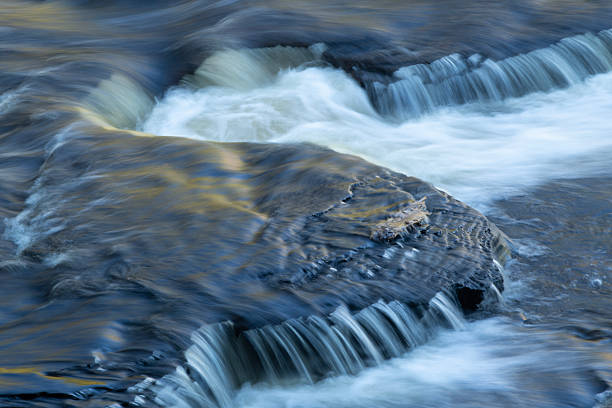 Small waterfalls at Presque Isle River Falls Loop Trail in Porcupine Mountains, Michigan, USA