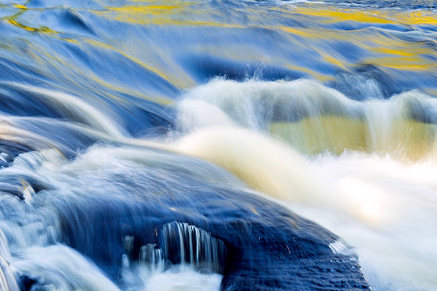 Waterfalls in Autumn at Presque Isle River Falls Loop Trail in Porcupine Mountains, Michigan, USA