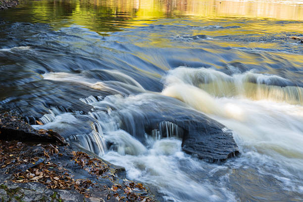 Waterfalls in Autumn at Presque Isle River Falls Loop Trail in Porcupine Mountains, Michigan, USA