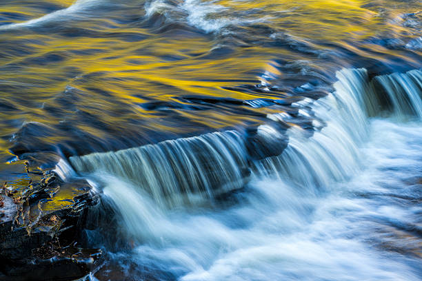 Waterfalls in Autumn at Presque Isle River Falls Loop Trail in Porcupine Mountains, Michigan, USA