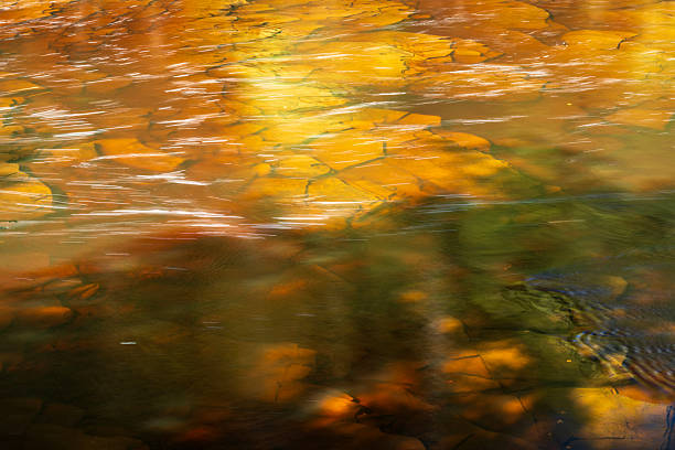 Red rock bed of Presque Isle River in Porcupine Mountains, Michigan, USA