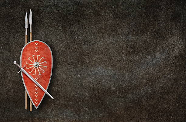 red viking shield sword and two lances on grunge background