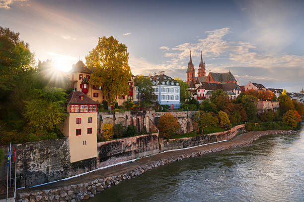 Basel, Switzerland on the Rhine River at sunsetin autumn.