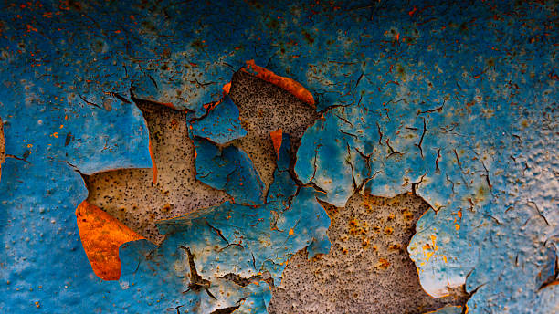 Old paint peeling off the wall of a building. Web banner. For design.
