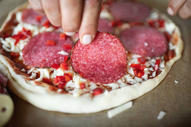 Man making pizza at home