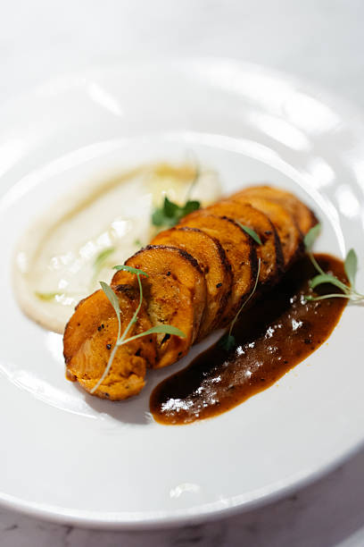 Gourmet Roasted Chicken Ballotine with Smooth Puree and Reduction Sauce