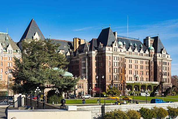 The waterfront with the Fairmont Empress Hotel in Victoria, British Columbia, Canada, on a sunny day.