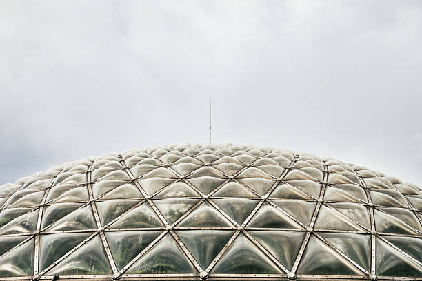 The dome of the Bloedel Conservatory in Queen Elizabeth Park, Vancouver, British Columbia, Canada, on an overcast day.