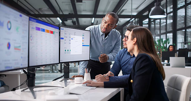 iverse Payroll Team Successfully Managing Data stock photo
