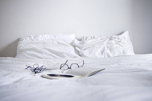 Notice paper on the bed of hotel room