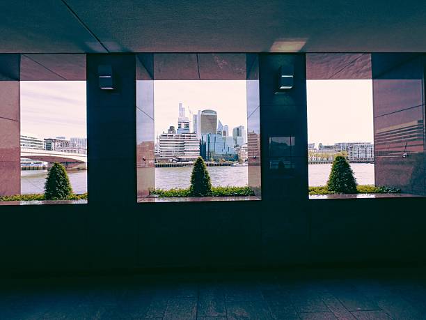 The London United Kingdom skyline along the Thames River including The Tower of London on the right
