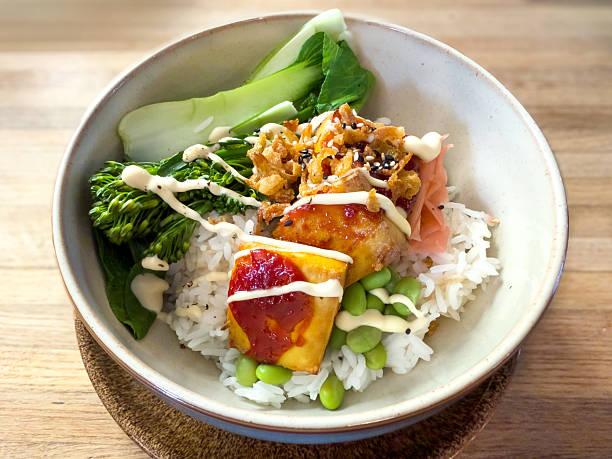 Nourishing buddha bowl with tofu, quinoa and vegetables