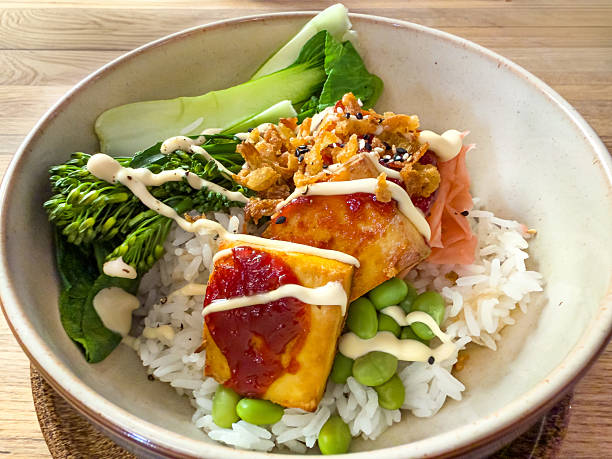 Nourishing buddha bowl with tofu, quinoa and vegetables