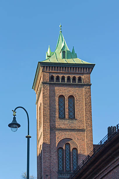 Historic Building Tower Brannvakten Neo Romanesque Style at Old Market in Oslo Norway Sunny Autumn