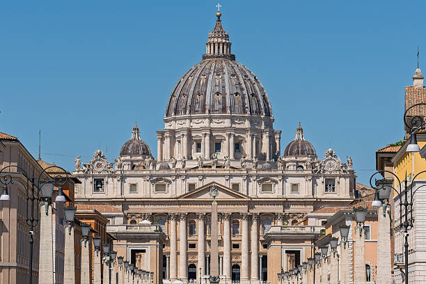 Italy - Rome - Vatican - St Peter's Basilica grand facade and towering dome command Via della Conciliazione approach