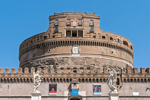 Italy - Rome - Castel Sant'Angelo - Baroque angel sculptures line historic bridge approaching monumental papal fortress