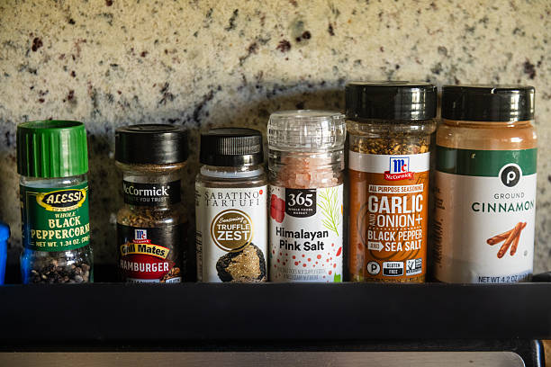 Assorted Spices in a Row in a Home Kitchen