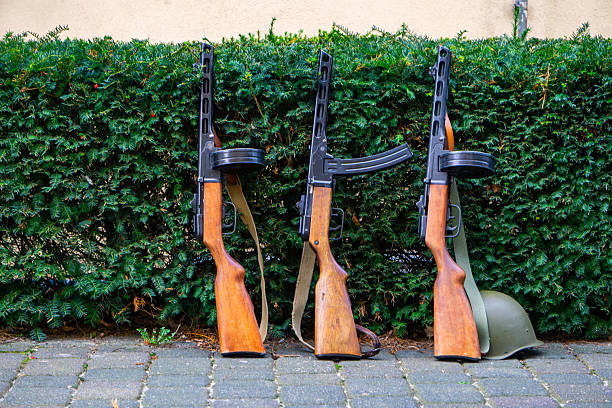 The Sten Gun was Britain's answer to the need of a sub machine gun, it cost $11 USD (in 1942), whereas the Thompson from the US cost over $70 USD. It was cheap and easy to produce, and was made in huge numbers for use by the british army and resistance fighters in europe.This image was taken at an outdoor event over the weekend of 11th-13th August 2023, where reenactors, living historians, and members of the public can come to experience what life was like during the second world war, with live demonstrations, battle reenactments, and static displays from all over the world.