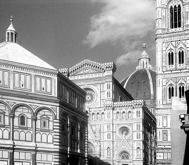 Florence Cathedral, Giotto's Bell Tower, and the Baptistery of St. John facade on a clear day in Italy. Scanned from analog film