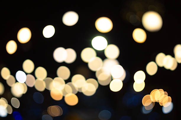 Defocused glowing circles creating an abstract and festive backdrop