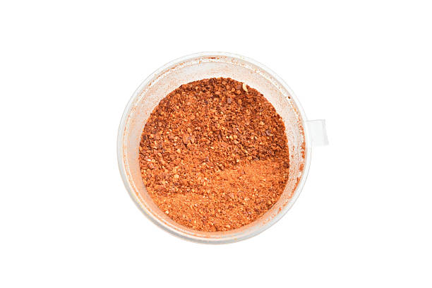 Cooking spice, hot ground chili pepper, isolated on white background.