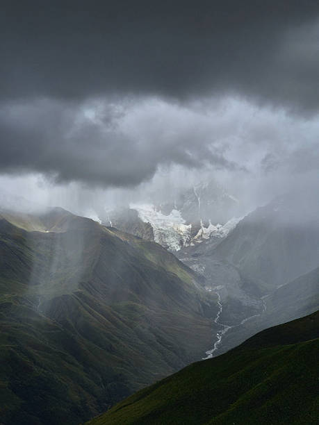 Shkhara Glacier And Mountain Valley Under Storm Clouds: Dramatic Light Near Ushguli Georgia