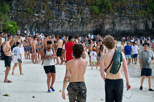 Crowded beach with tourists on Koh Phi Phi Island Thailand
