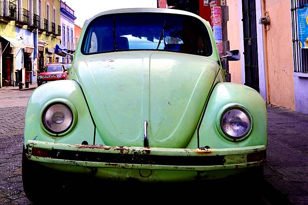 Leiria, Portugal September 29, 2024, Volkswagen karmann ghia classic car parked on cobblestones on a sunny day