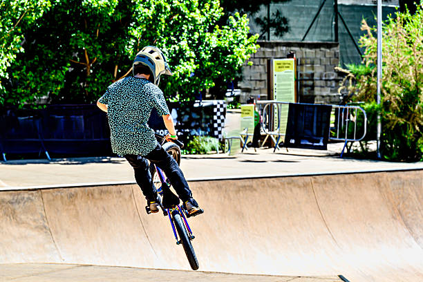 Close up of bmx bike on a ramp in a skatepark, BMX concept.