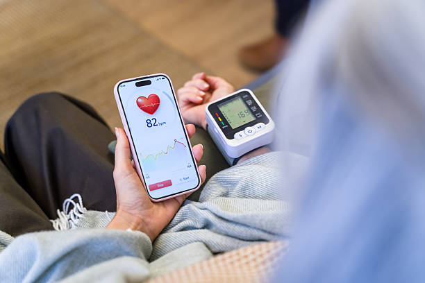 istock Person checking heart rate and blood pressure through app 2260089377