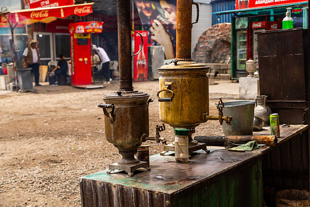 samovars at outdoor roadside kattama cafe in Cholok, Kyrgyzstan - July 16, 2024